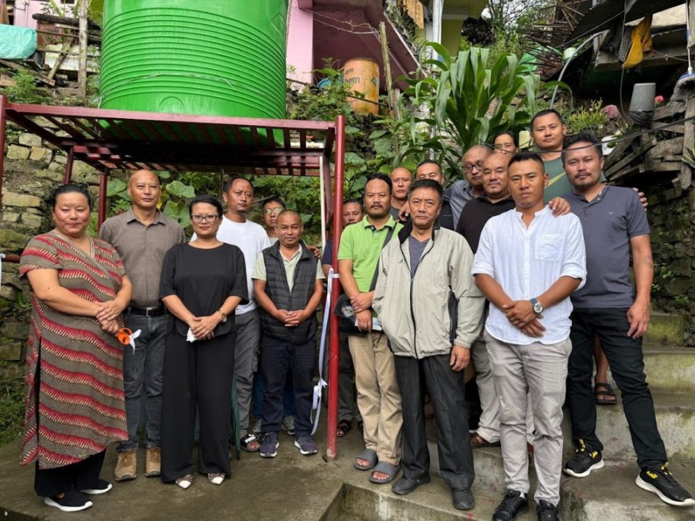 Thenusou Sekhose Yhome and others during the inauguration of drinking water facility in Kohima on July 22.